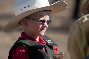 Although all contestants take home a belt buckle, this young gent also added a trophy to his case for bringing in the best time.