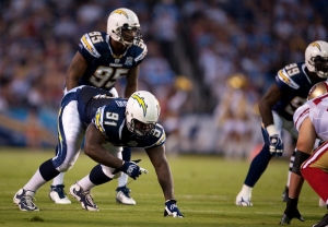 Nwagbuo at defensive end with linebacker Shaun Phillips. (Mike Nowak/San Diego Chargers)