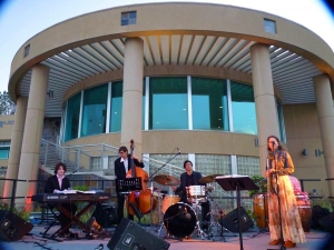 Band performs in front of new science and technology building.