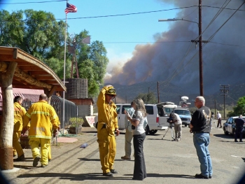 Firefighters order evacuation of Barrett Junction as fire bursts over hill from Potrero, photo by Miriam Raftery